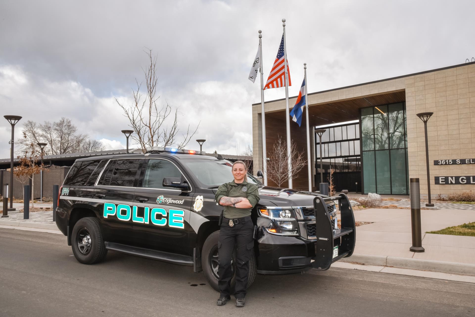 Police Officer in front of police car