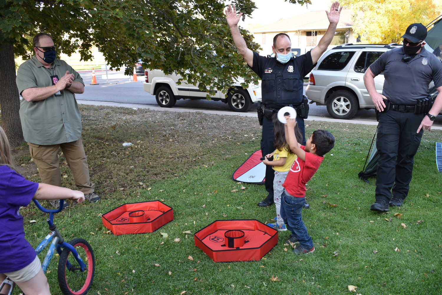 Police Officer playing with kid